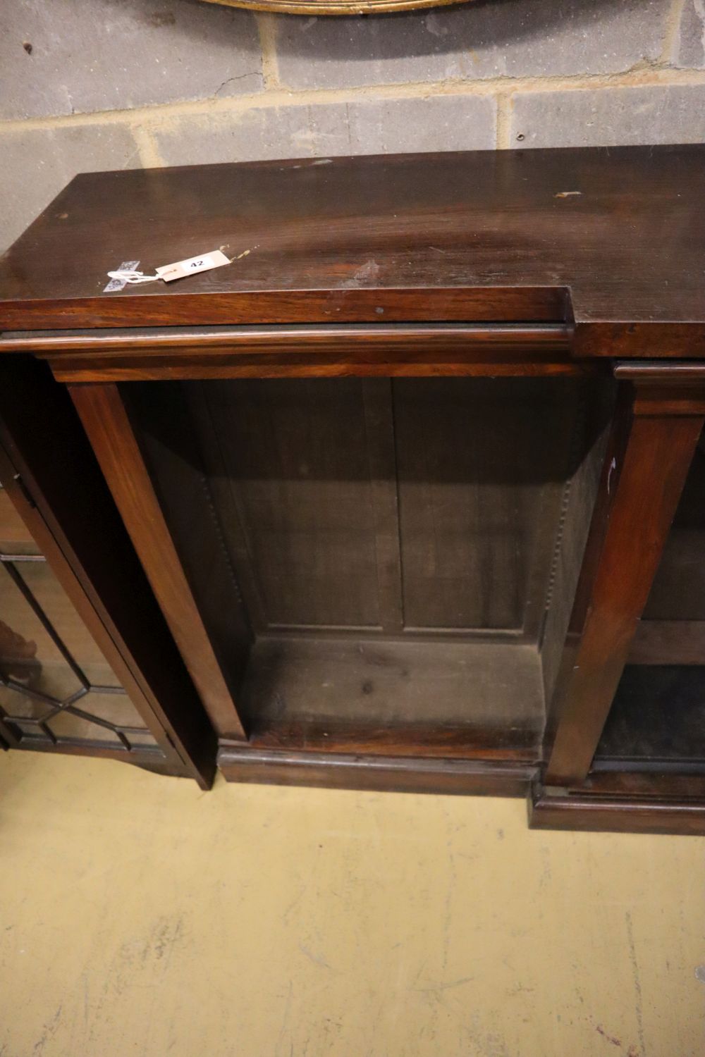 A Victorian rosewood breakfront open bookcase, width 264cm, depth 40cm, height 107cm